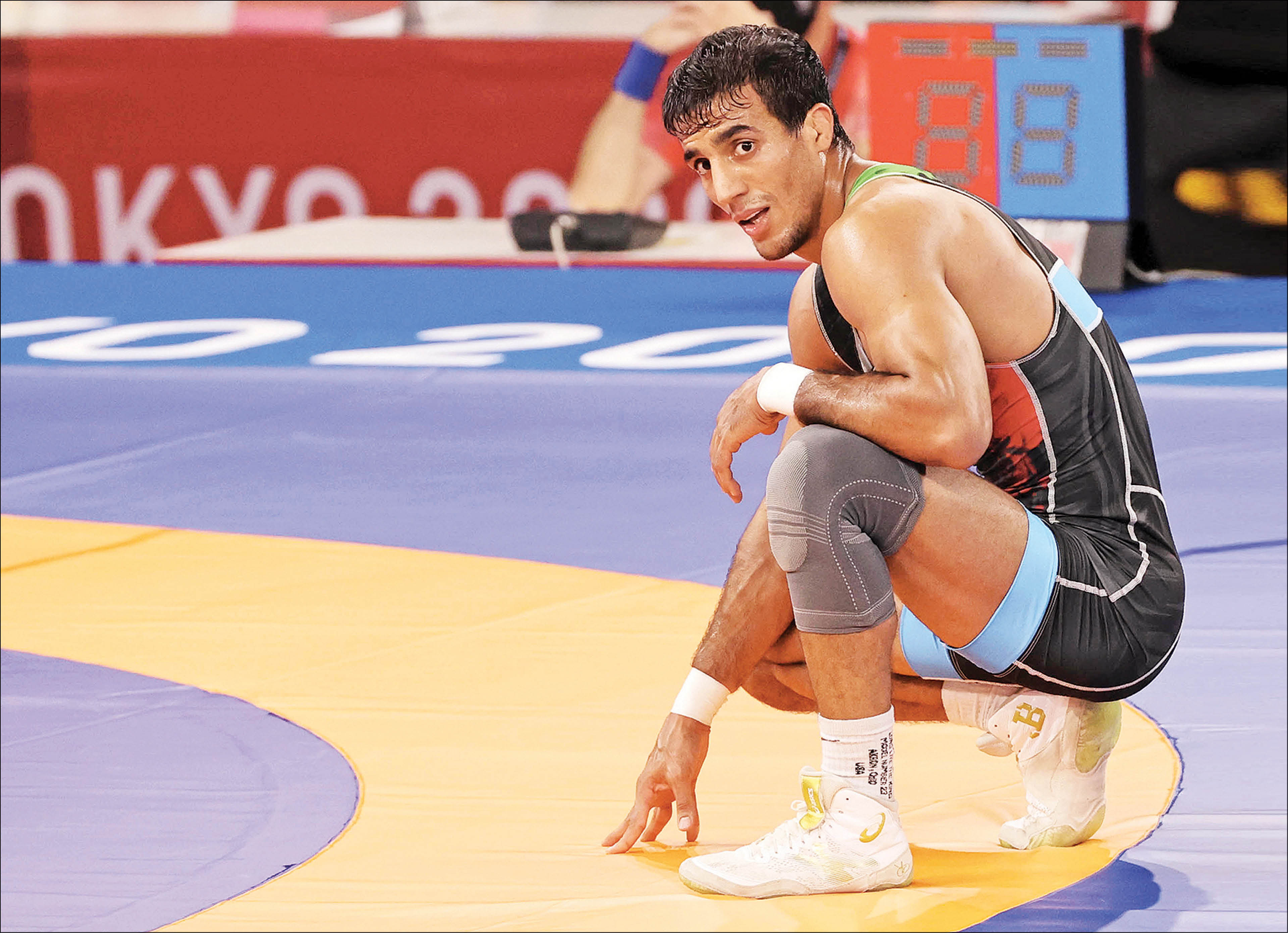 با محمدعلی گرایی که متخصص اجرای فنون ناب کشتی فرنگی است