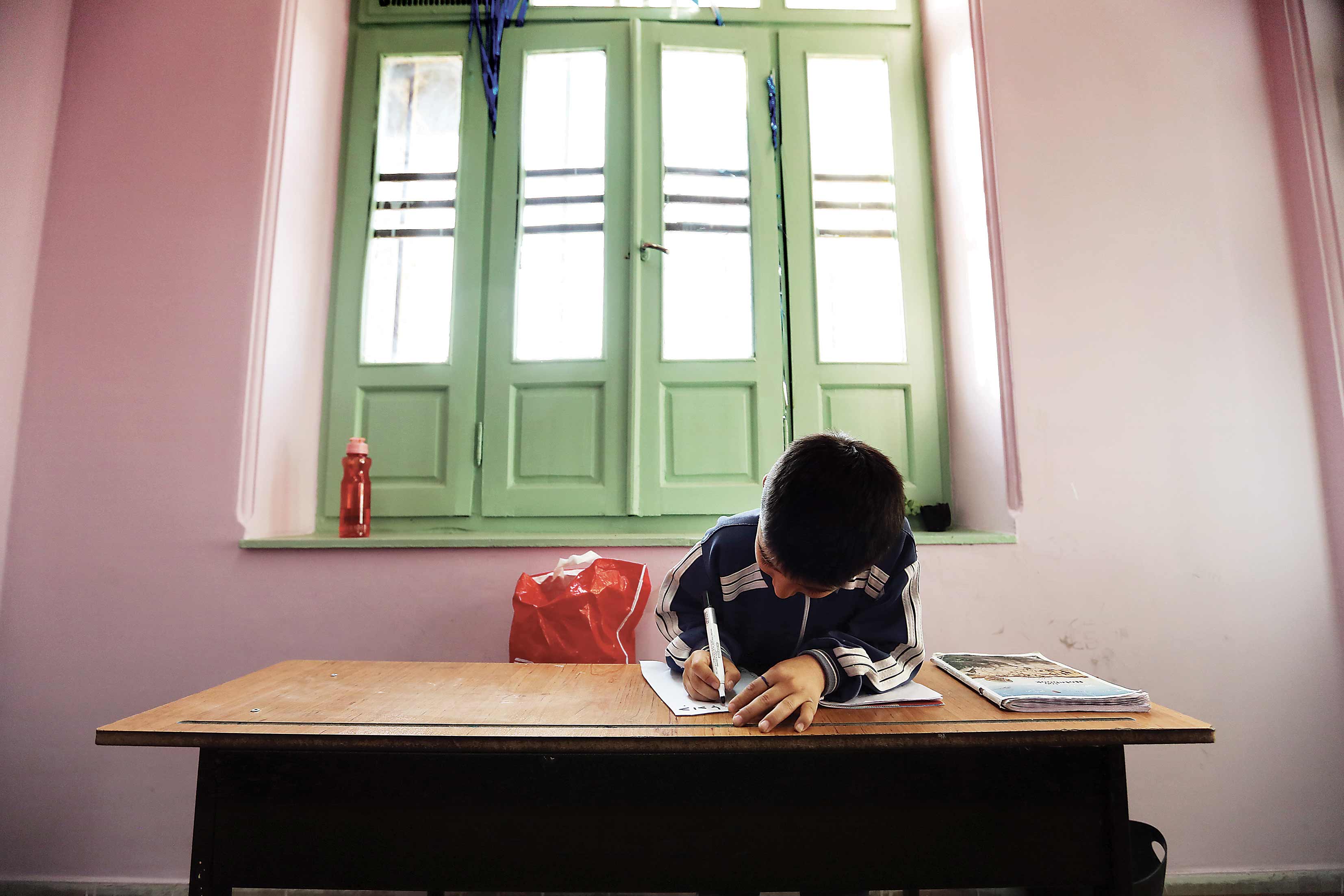 کاهش 50 درصدی دانش‌آموزان افغان